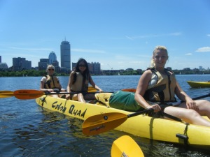 Kayaking with the skyline of Boston in the background