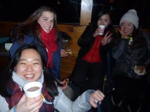 Jamie and Sammi from South Africa, Nina from Germany and Joyce from China while warming up with hot chocolate