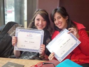 Marie from France and Ana from Spain both received their education of completion certificate today