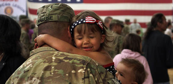 Welcoming home her Daddy!