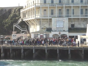 6721951-Alcatraz-tour-group-Note-Indians-welcome-sign-0