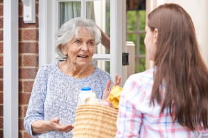 Delivering groceries to a neighbor is a friendly volunteer activity.