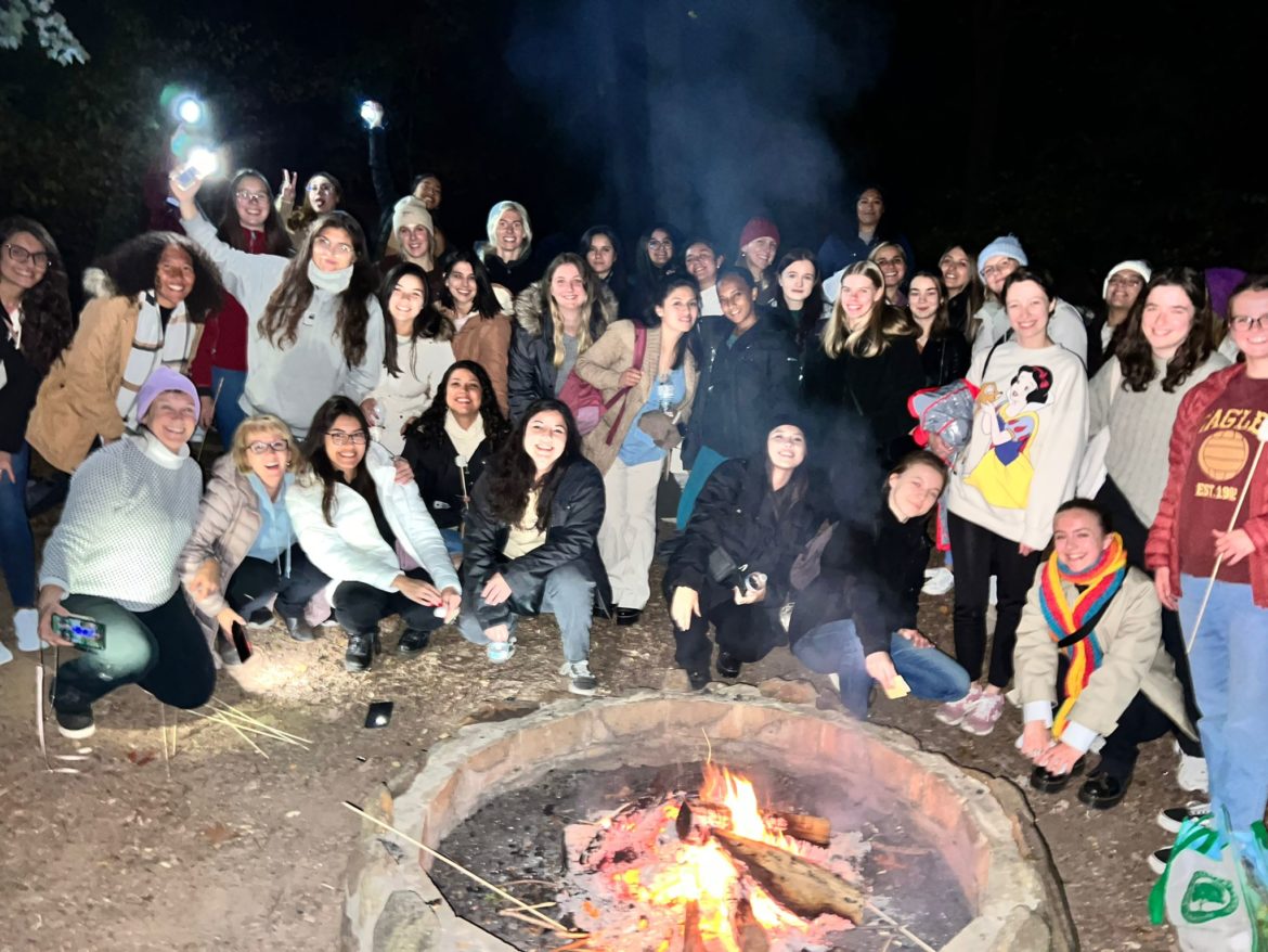 Au pairs in Maryland enjoying a campfire and s'mores