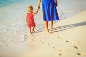 mother and daughter at the beach