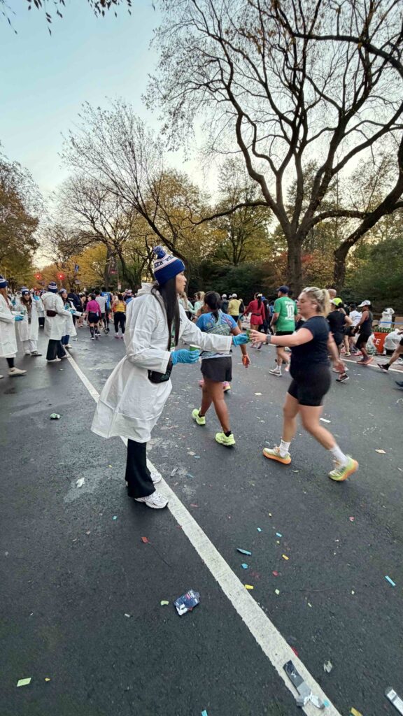 Au Pair in America au pair volunteer at the 2025 NYC Marathon