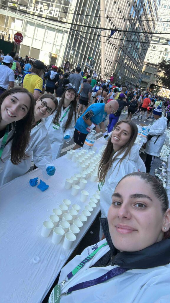 Au Pair in America au pair volunteers at the 2025 NYC Marathon