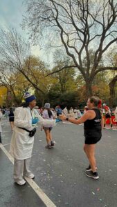 Au Pair in America au pair volunteers at the 2025 NYC Marathon