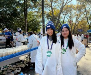 Au Pair in America au pair volunteers at the 2025 NYC Marathon