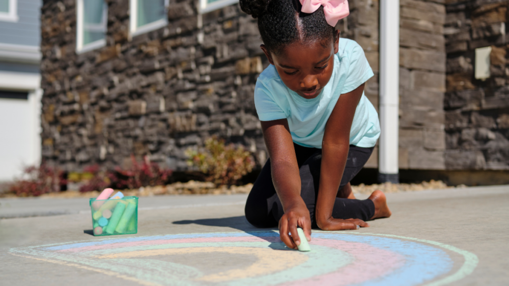 Child using chalk