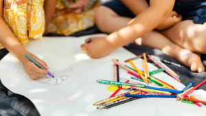 Children drawing outside