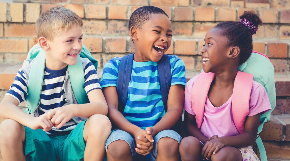 Kids talking with friends - back to school