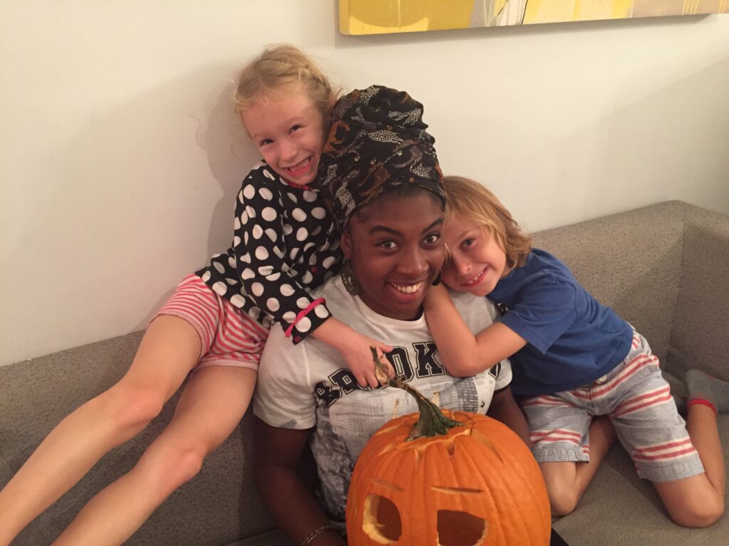 Host family and au pair on Halloween